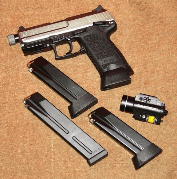 A USP, a Jet Funnel Mag, a Xgrip spacer, and a dremmel...